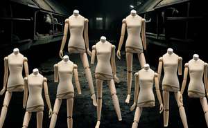 Mannequins in a slaughterhouse with limbs missing.